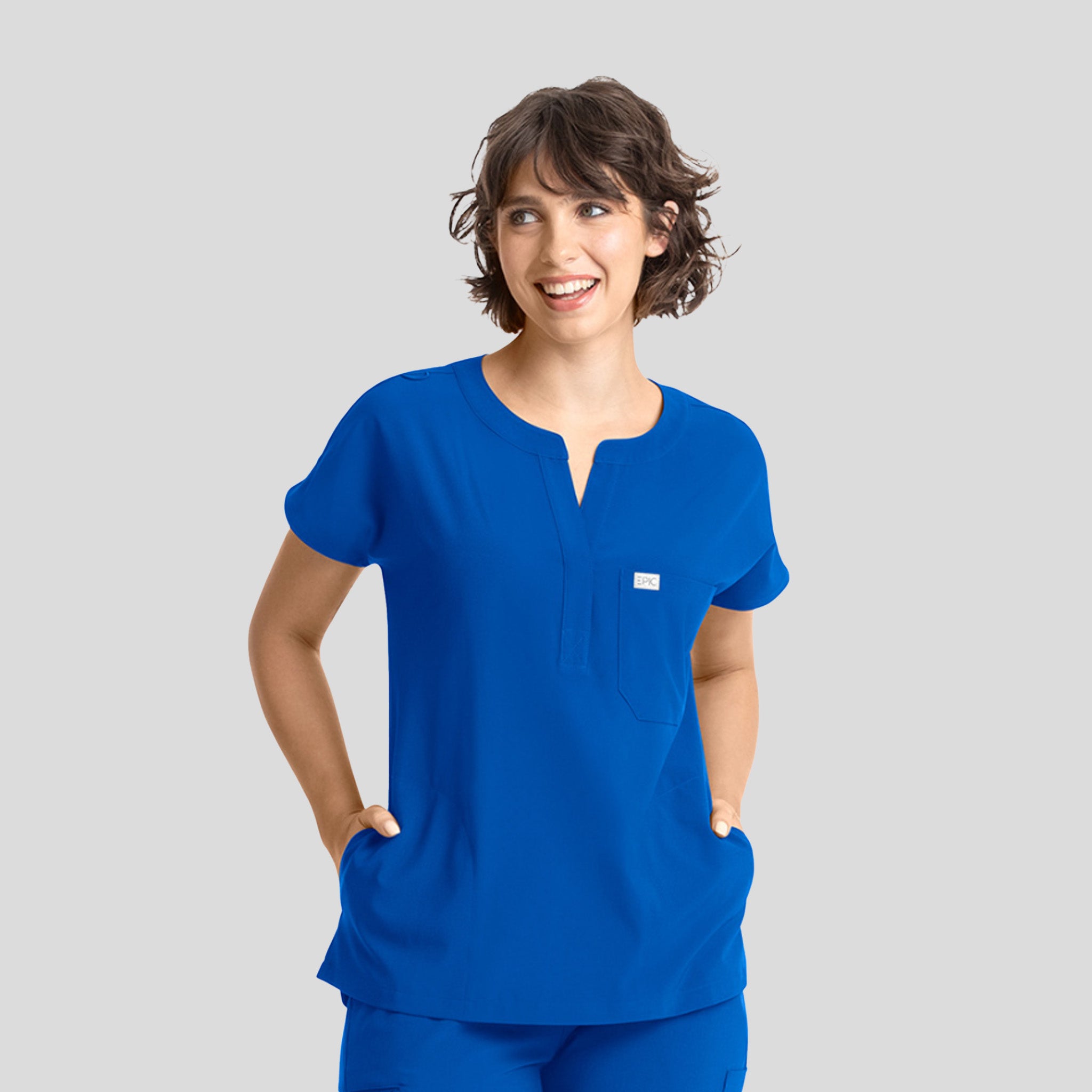 Womenโs Dolman 3 Pocket Top | Royal