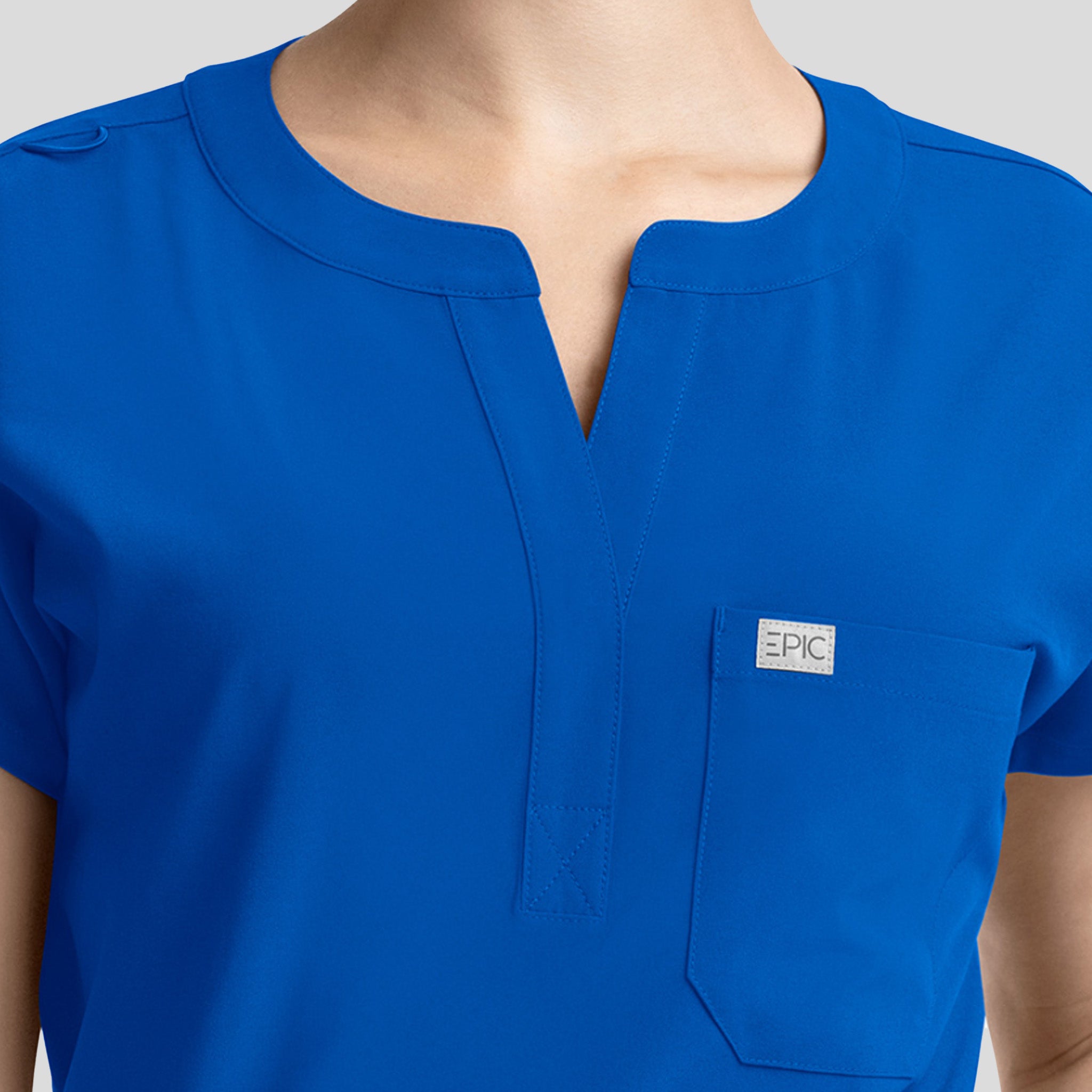 Womenโs Dolman 3 Pocket Top | Royal
